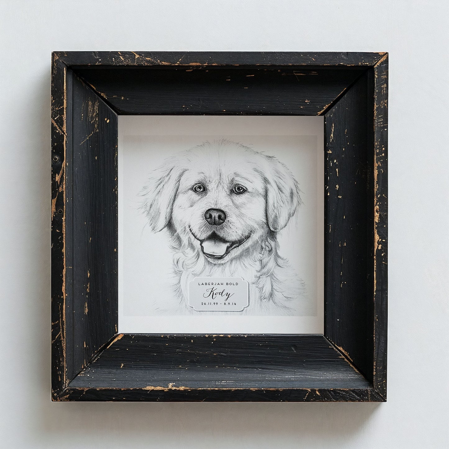 Framed black and white portrait of a dog on a light gray background