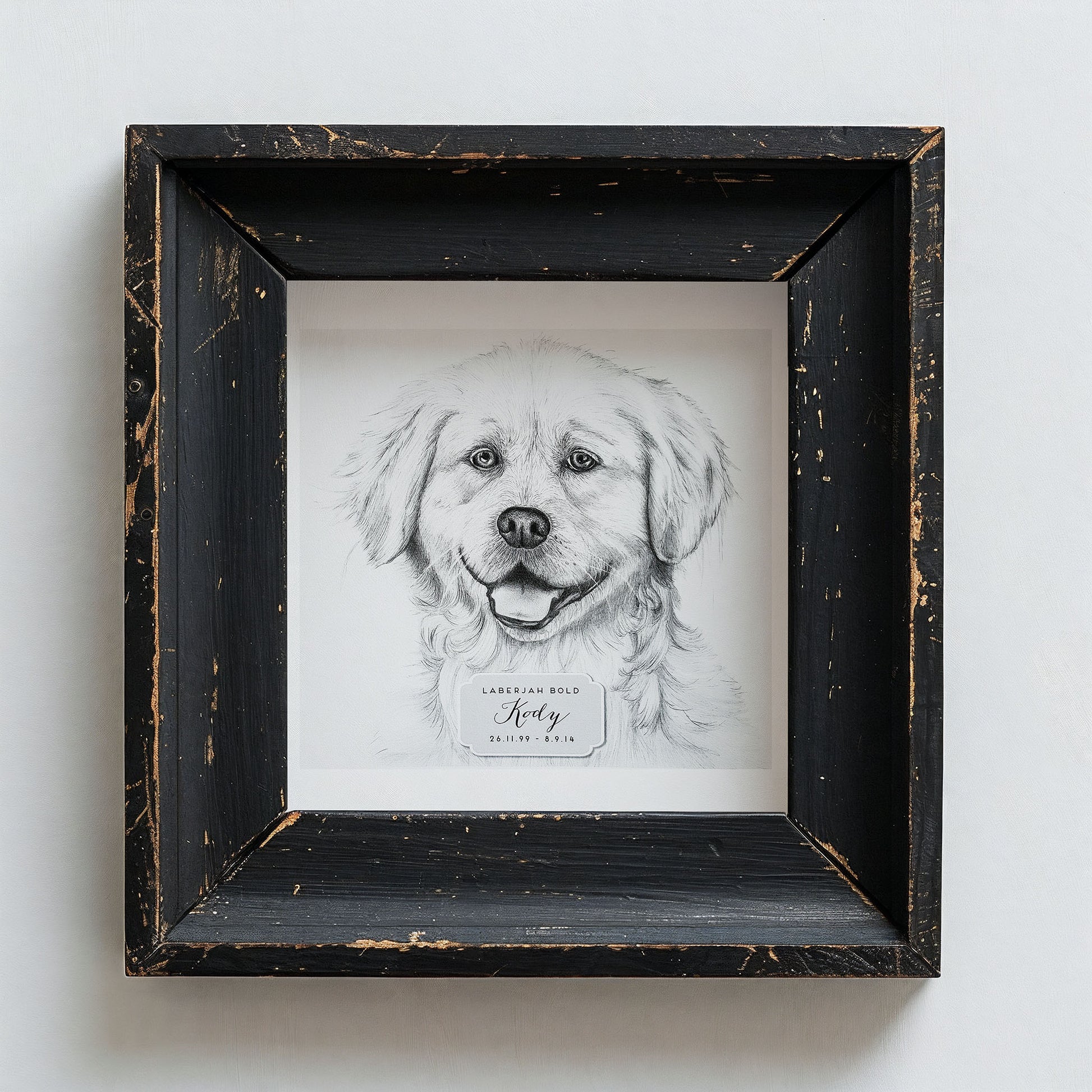 Framed black and white portrait of a dog on a light gray background