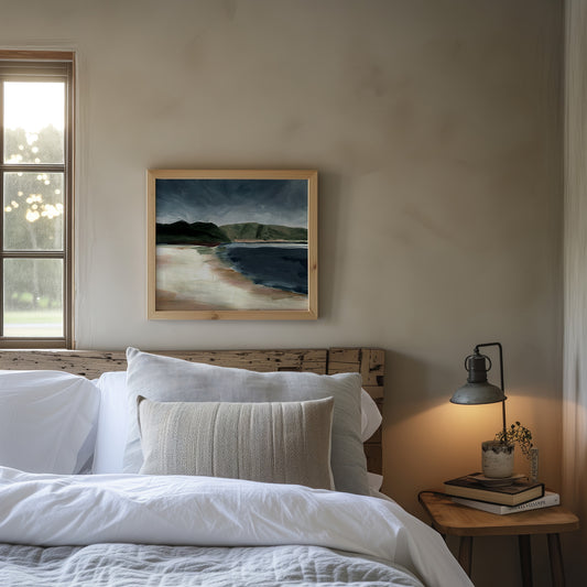 Bedroom with wooden headboard, white bedding, and framed artwork on the wall.